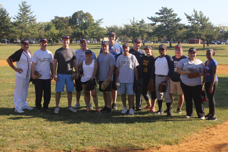 The blue team in NAI James E. Hanson's first-ever company softball game in Hackensack.