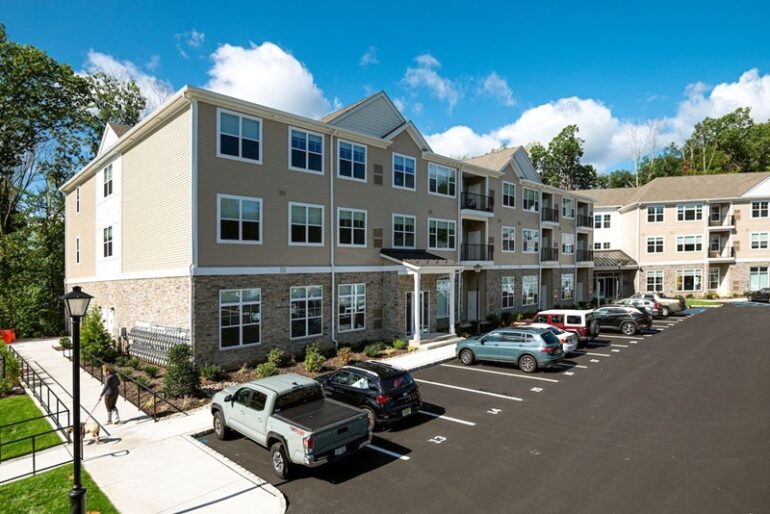 Woodmont touts full leaseup of 120unit rental property near